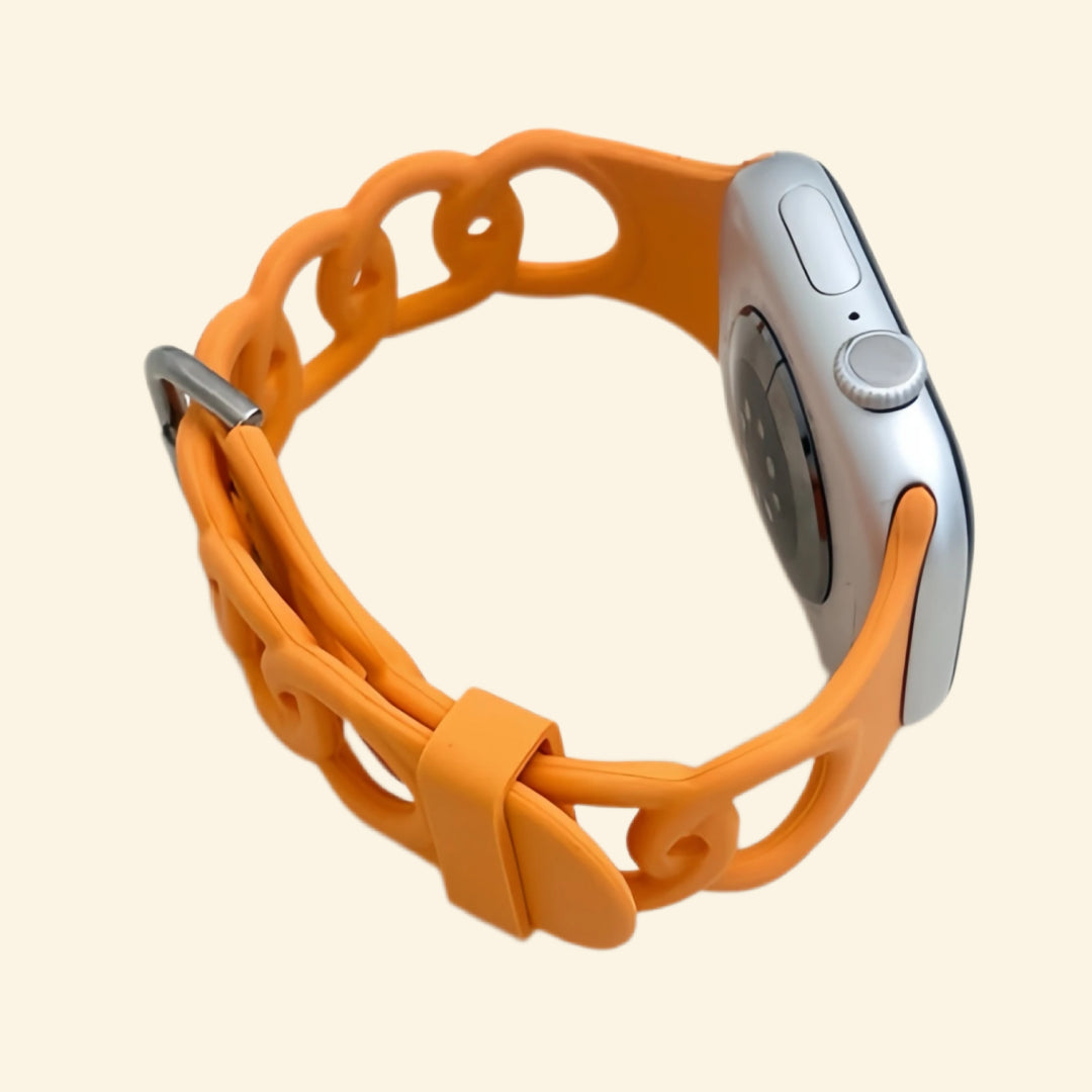 Vibrant Orange Cutout Chain Link Silicone Band — rear sensor view on Apple Watch