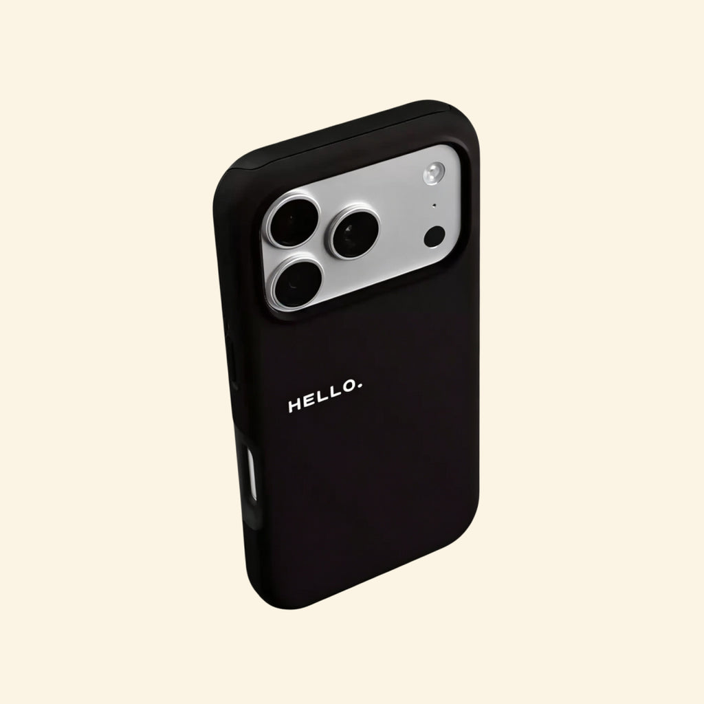 The Void Greeting case – angled floating view showing HELLO. text on deep matte black shell