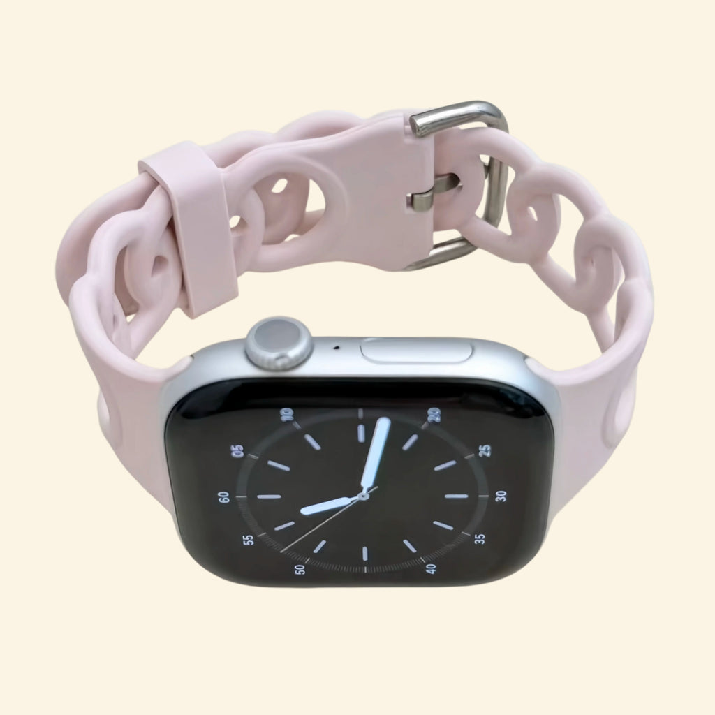 Pale Sakura Pink Cutout Chain Link Silicone Band — front face view on Apple Watch