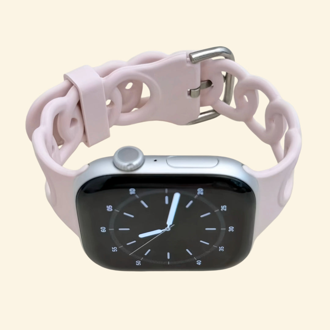 Pale Sakura Pink Cutout Chain Link Silicone Band — front face view on Apple Watch