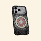 The Sacred Mandala case – hand-held lifestyle shot showing full mandala artwork
