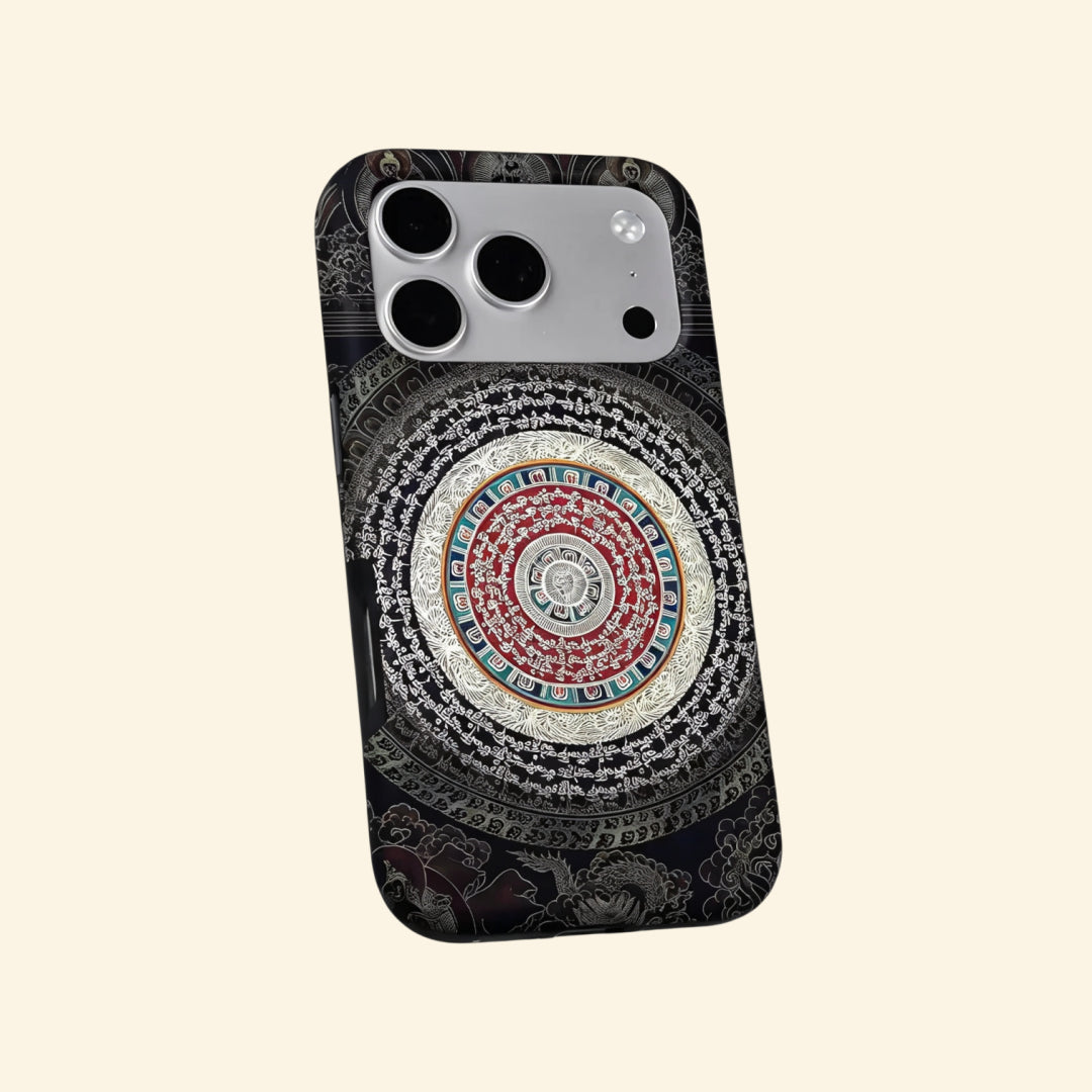 The Sacred Mandala case – hand-held lifestyle shot showing full mandala artwork