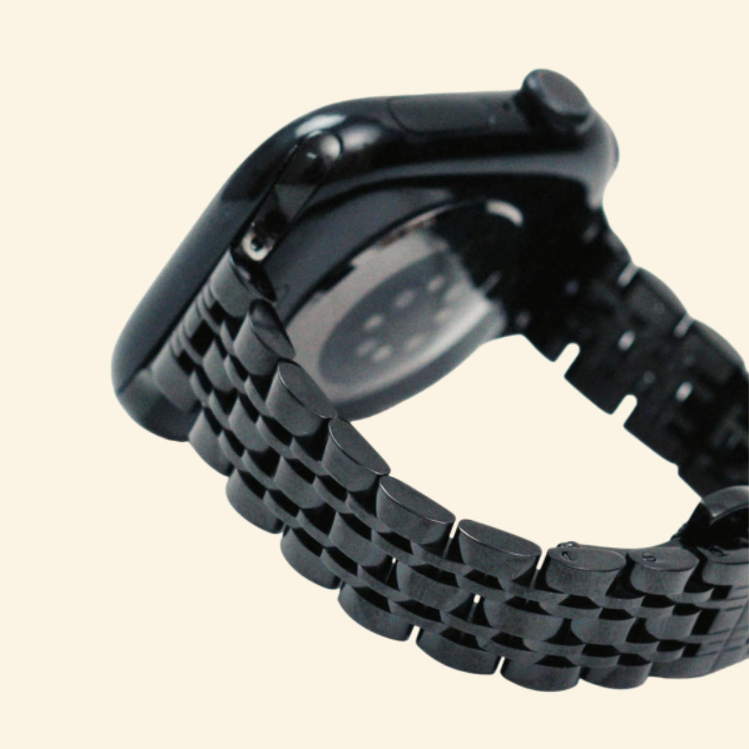 Obsidian Black Jubilee Band — close-up link detail with Apple Watch
