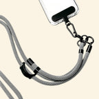 The Core Cord Monochrome Grid – lanyard attached to phone case detail view