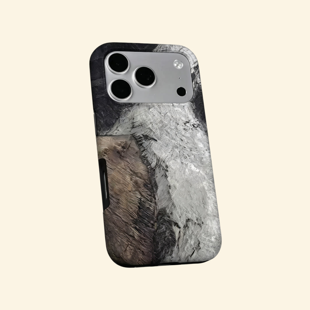The Glacial Strata case – hand-held lifestyle shot showing full glacial strata artwork