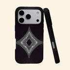 The Sonic Starburst case – angled floating view showing four-pointed rhombus concentric line pattern on matte black