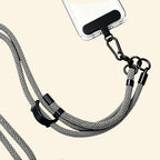 The Core Cord Monochrome Zebra Stripe – lanyard attached to phone case detail view