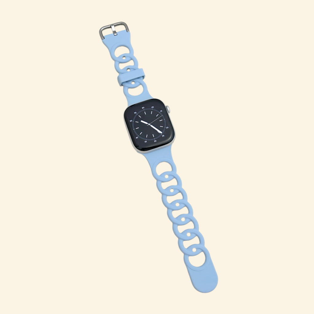 Glacier Blue & Slate Grey Cutout Chain Link Band — rear sensor view on Apple Watch