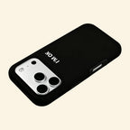 The Statement Case – "I'M OK" Matte Black Magnetic Protective Shell - Carapace StudioPhone CaseCarapace StudioCarapace StudioCS-801-IP16PMiPhone 16 Pro MaxI'M OK Magnetic Case – hand holding