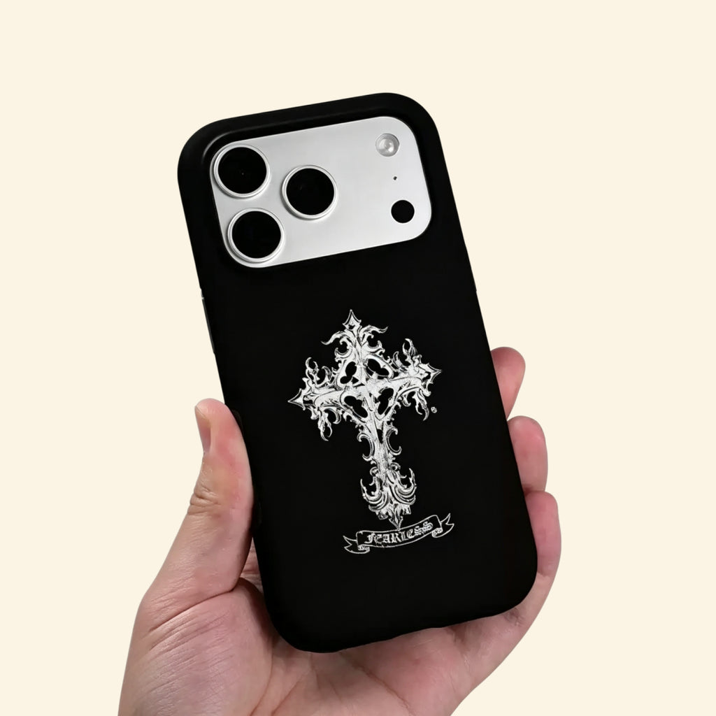 The Fearless Emblem case – floating front view showing full gothic cross filigree and ribbon scroll detail