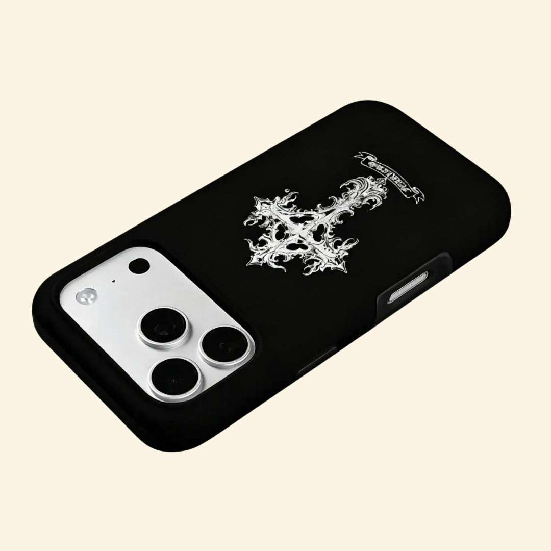 The Fearless Emblem case – hand-held lifestyle shot showing full ornate gothic cross and FEARLESS inscription