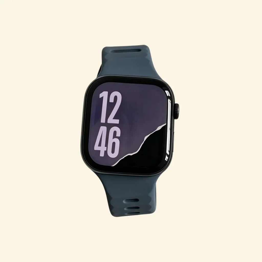 Abyssal Midnight Navy Ocean Wave Apple Watch Band — front wrist view on cream background