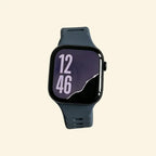 Abyssal Midnight Navy Ocean Wave Apple Watch Band — front wrist view on cream background