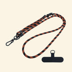 The Core Cord Tactical Amber Stripe – full lanyard coiled flat lay
