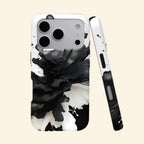 The Ink Flower case – angled floating view showing explosive black ink bloom on white shell