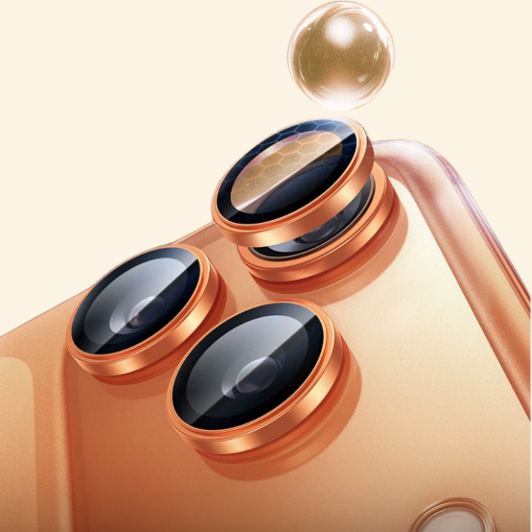 Rose gold aluminum alloy camera lens ring protectors on iPhone — close-up of triple-lens camera module with honeycomb AR coating visible on top lens, cream background