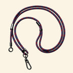The Core Cord Crimson Navy Stripe – lanyard attached to phone case detail view