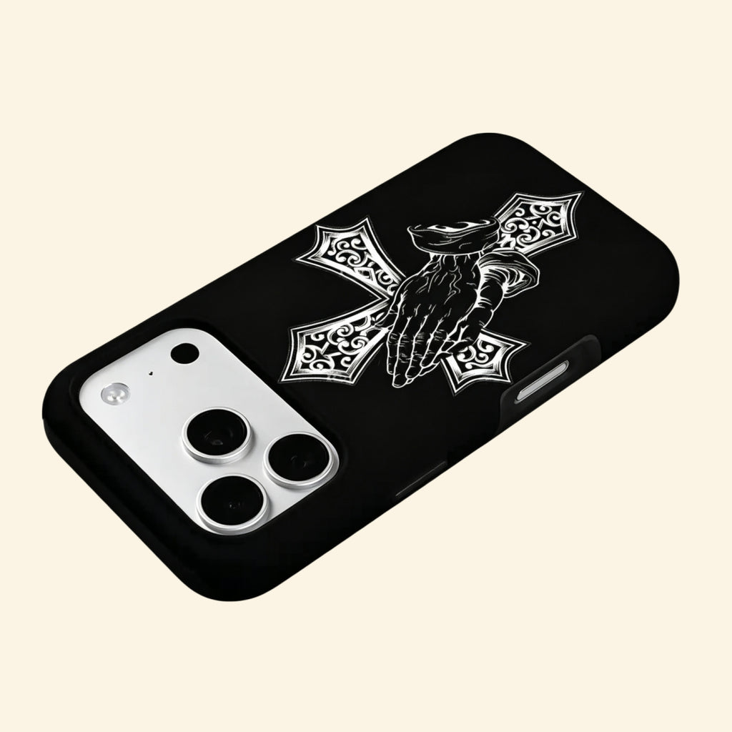 The Devotional Emblem case – low-angle floating view showing camera island and gothic cross with praying hands