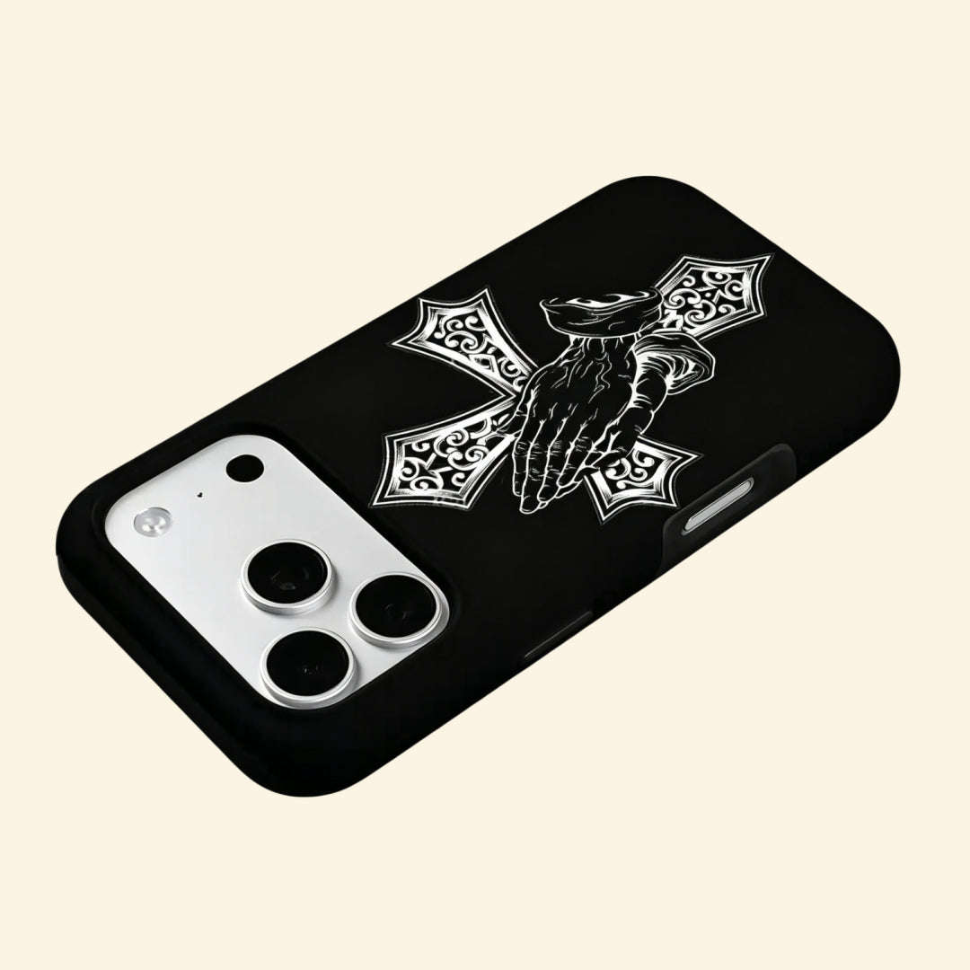 The Devotional Emblem case – low-angle floating view showing camera island and gothic cross with praying hands