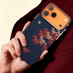 Specimen No. 10548 Navy Steed Aramid iPhone Case — lifestyle hand hold in crimson suit
