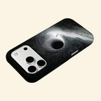 The Singularity – Black Hole Event Horizon & Cosmic Wanderer iPhone Case - Carapace StudioPhone CaseCarapace StudioCarapace StudioCS-3323-SINGULARITY-5iPhone 16 Pro MaxThe Singularity case – hand-held lifestyle shot showing full black hole event horizon and solitary figure artwork