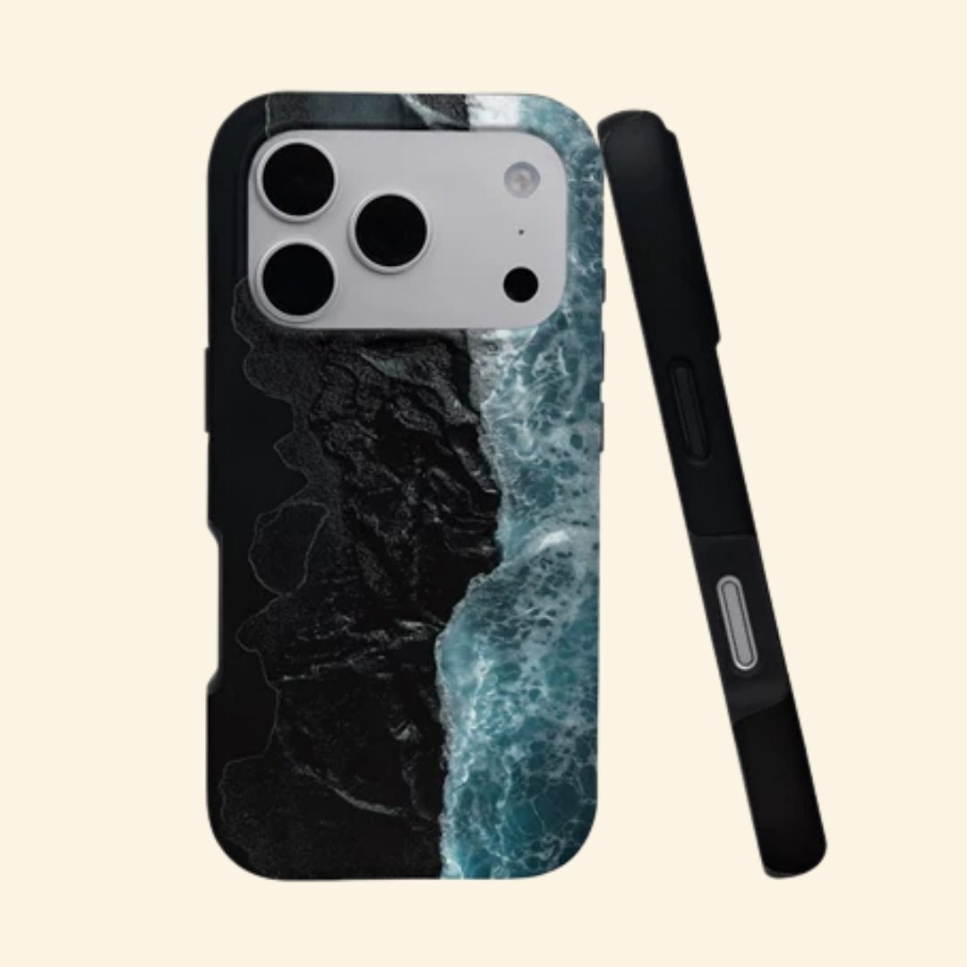 The Basalt Shore – Volcanic Black Sand & Ice-Blue Sea iPhone Case - Carapace StudioPhone CaseCarapace StudioCarapace StudioCS-3626-BASALT-SHORE-1iPhone 17 Pro MaxThe Basalt Shore case – angled floating view showing aerial volcanic black sand beach with crashing ice-blue waves