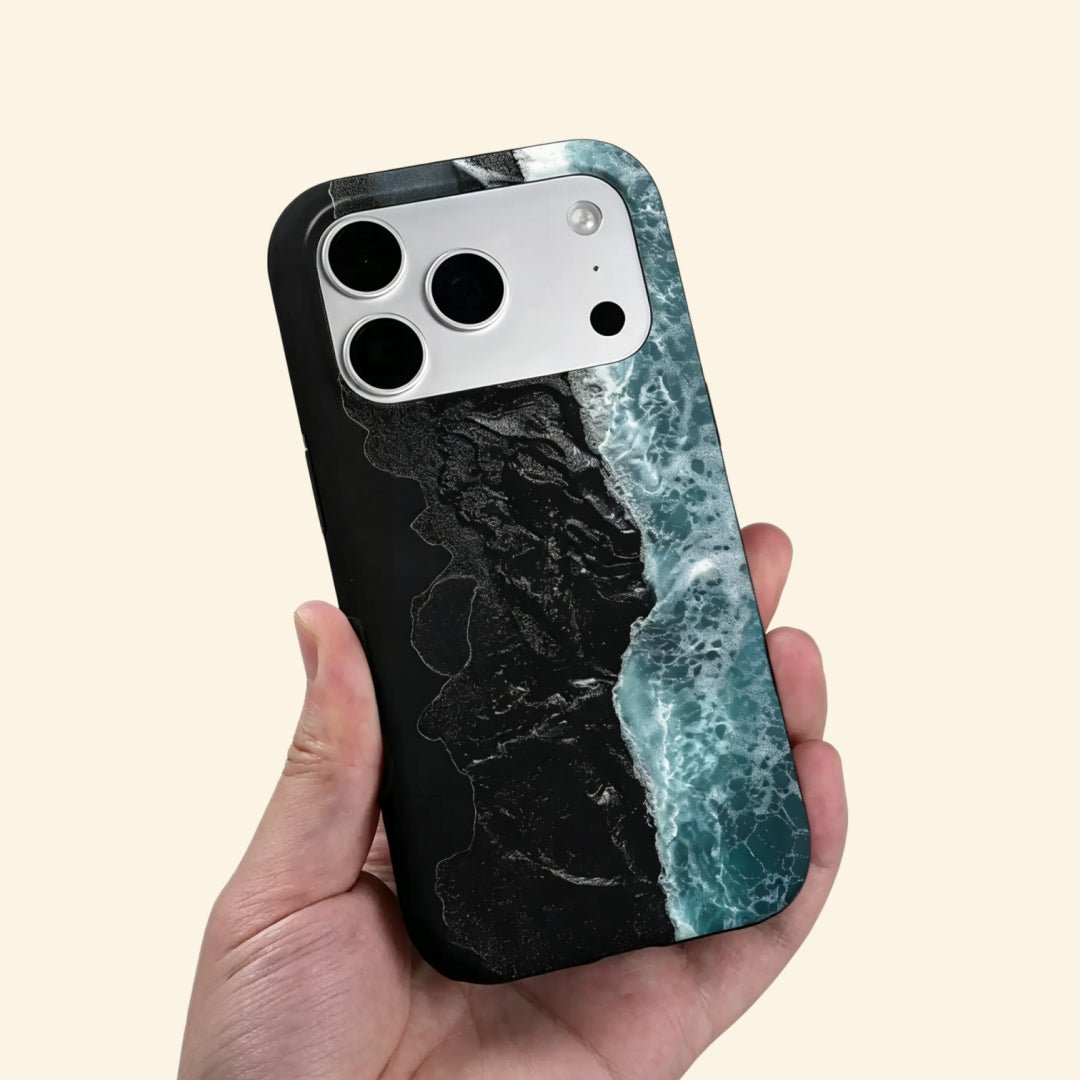 The Basalt Shore – Volcanic Black Sand & Ice-Blue Sea iPhone Case - Carapace StudioPhone CaseCarapace StudioCarapace StudioCS-3626-BASALT-SHORE-5iPhone 16 Pro MaxThe Basalt Shore case – low-angle top-down view showing camera island and black sand wave foam detail