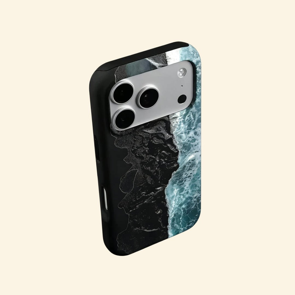 The Basalt Shore – Volcanic Black Sand & Ice-Blue Sea iPhone Case - Carapace StudioPhone CaseCarapace StudioCarapace StudioCS-3626-BASALT-SHORE-5iPhone 16 Pro MaxThe Basalt Shore case – front flat lay with side profile showing full basalt shore aerial print and dual-layer shell
