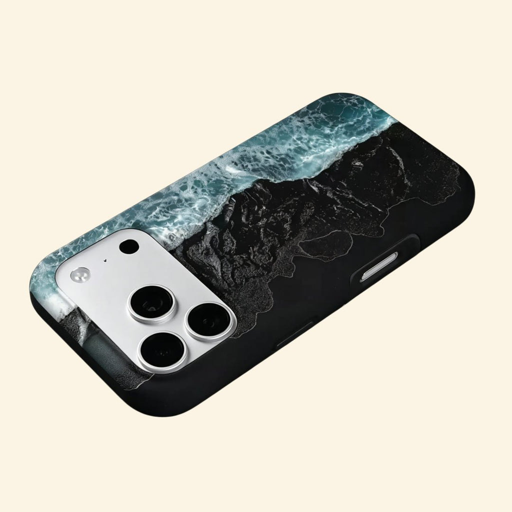 The Basalt Shore – Volcanic Black Sand & Ice-Blue Sea iPhone Case - Carapace StudioPhone CaseCarapace StudioCarapace StudioCS-3626-BASALT-SHORE-5iPhone 16 Pro MaxThe Basalt Shore case – second angled floating view showing stark contrast between black basalt and icy ocean foam