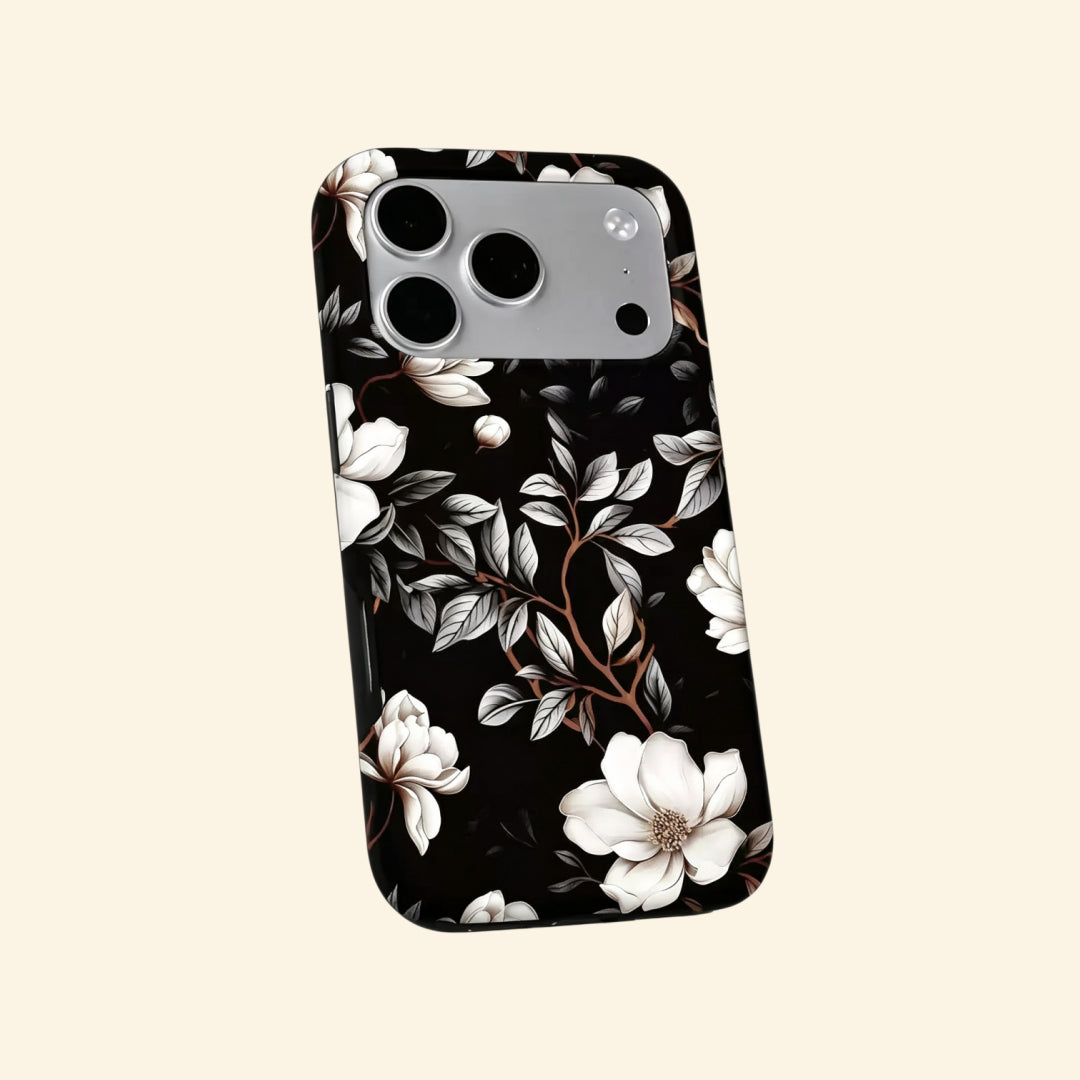 The Midnight Bloom case – second angled floating view showing full botanical magnolia print and dual-layer shell
