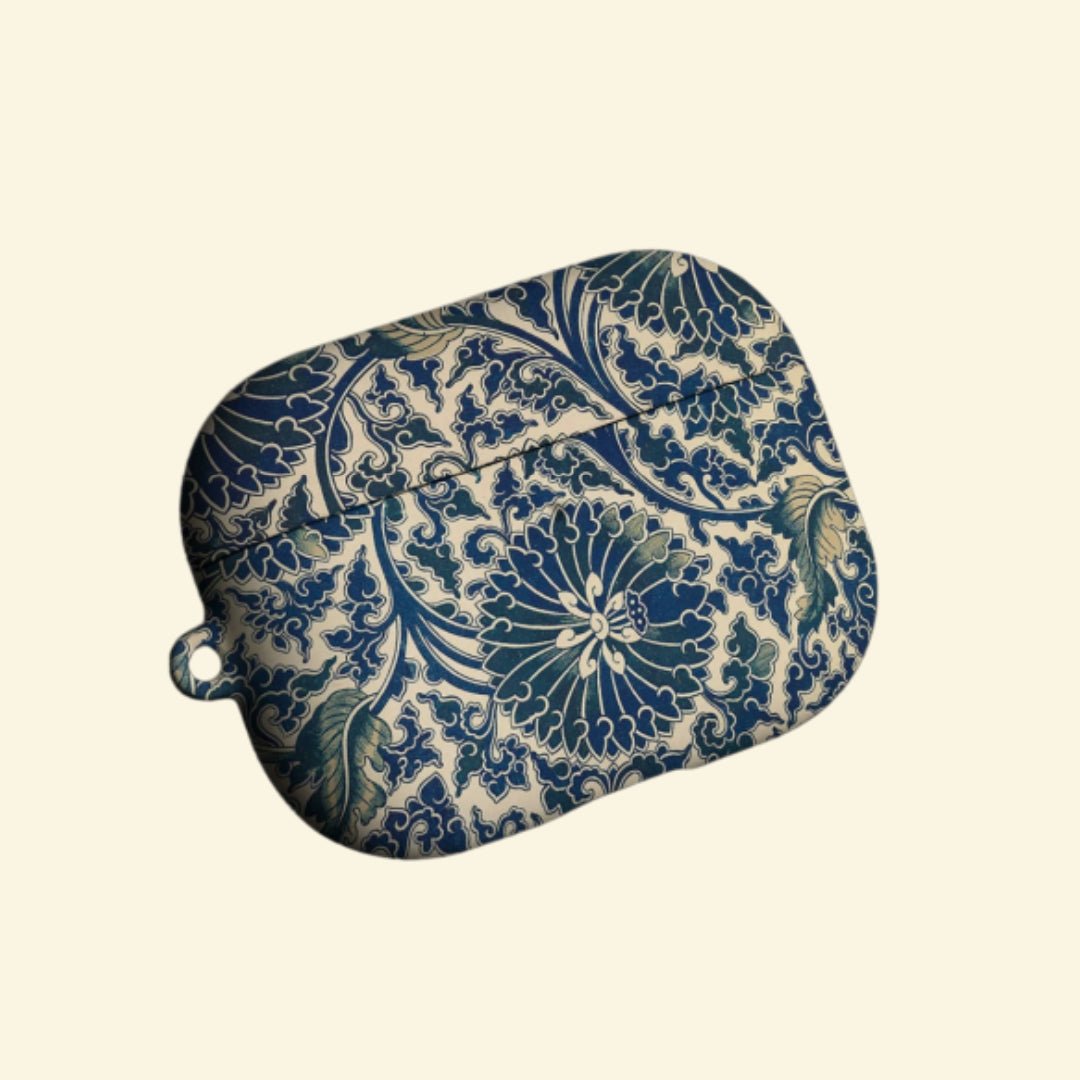 The Indigo Arabesque — Antique Porcelain & Botanical Damask Hard Case for AirPods Pro 3 & AirPods 4 - Carapace StudioAirPods CaseCarapace StudioCarapace StudioAirPods Pro 3Indigo Arabesque AirPods case open with earbuds