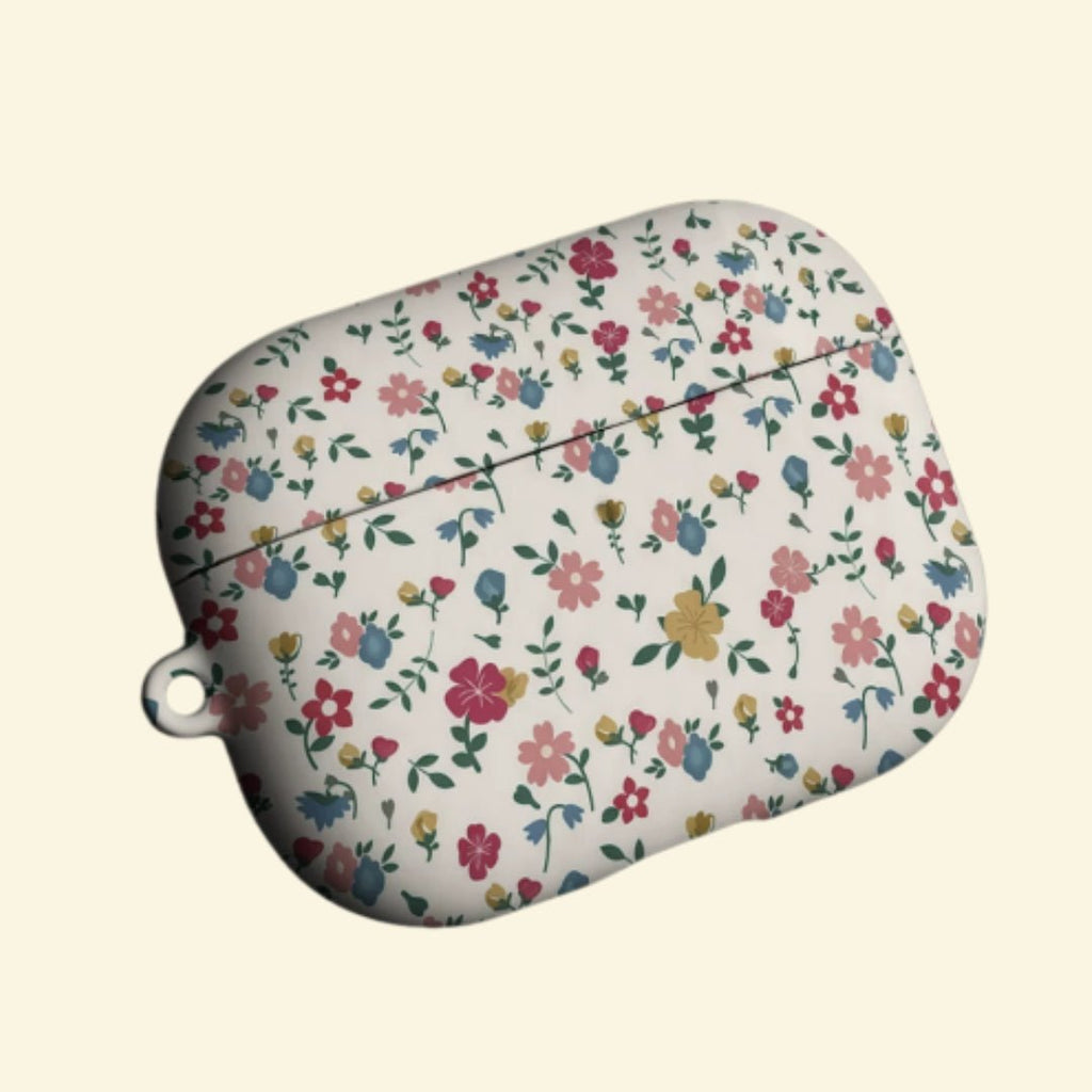 The Vintage Meadow — Retro Ditsy Wildflower Hard Case for AirPods Pro 3 & AirPods 4 - Carapace StudioAirPods CaseCarapace StudioCarapace StudioAirPods Pro 3Vintage Meadow AirPods case open with earbuds