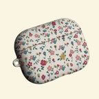 The Vintage Meadow — Retro Ditsy Wildflower Hard Case for AirPods Pro 3 & AirPods 4 - Carapace StudioAirPods CaseCarapace StudioCarapace StudioAirPods Pro 3Vintage Meadow AirPods case open with earbuds