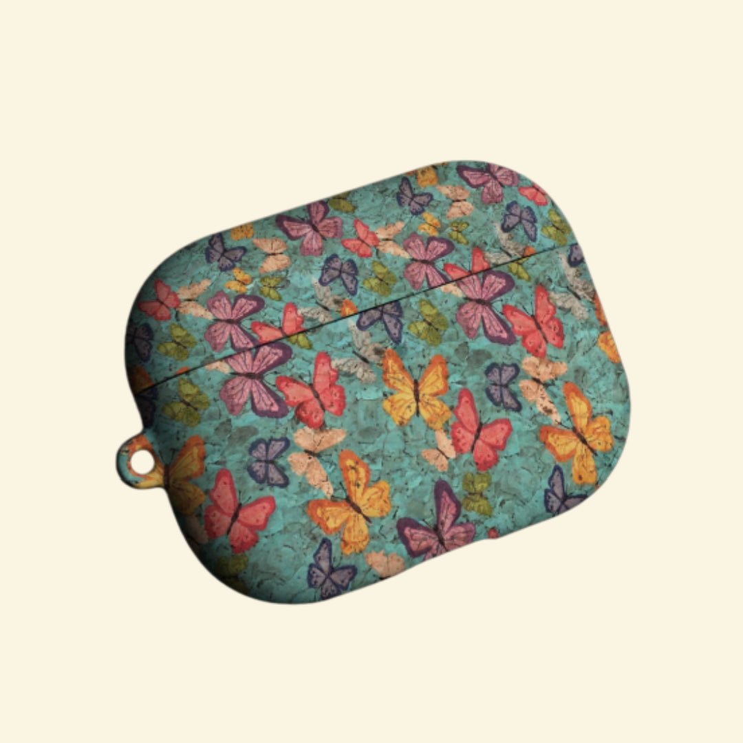 The Turquoise Papillon — Vintage Butterfly Cork Texture Hard Case for AirPods Pro 3 & AirPods 4 - Carapace StudioAirPods CaseCarapace StudioCarapace StudioAirPods Pro 3Turquoise Papillon AirPods case angled view