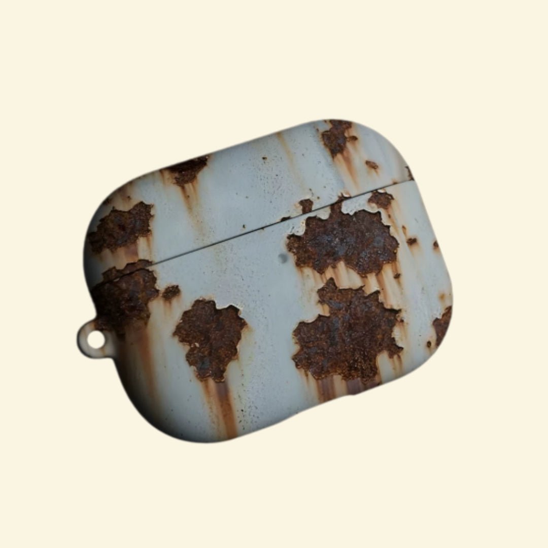The Corroded Steel — Vintage Industrial Rusted Metal Hard Case for AirPods Pro 3 & AirPods 4 - Carapace StudioAirPods CaseCarapace StudioCarapace StudioAirPods Pro 3Corroded Steel AirPods case angled view