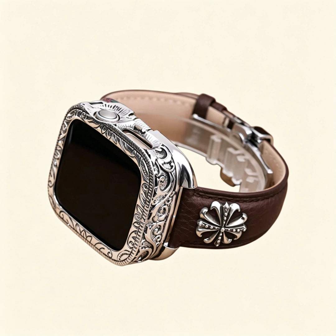 Dark espresso brown pebble-grained leather Apple Watch strap — diagonal close-up showing stainless steel butterfly deployment clasp open, double-push button mechanism detail