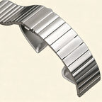 Precision butterfly deployment clasp detail — double-push button buckle