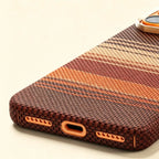 Specimen No. 10550 — Earthy Strata Gradient Aramid Case for iPhone - Carapace StudioiPhone CaseCarapace StudioCarapace StudioCS-10550-STRATA-1iPhone 17 Pro MaxSpecimen No. 10550 Strata Tapestry Aramid iPhone Case — bottom USB-C port detail, terracotta weave