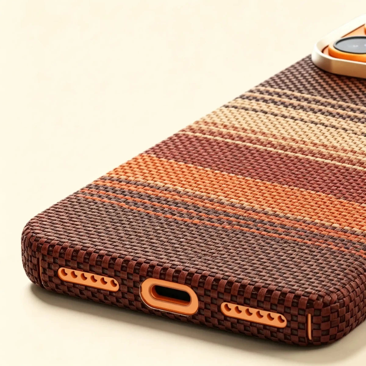 Specimen No. 10550 — Earthy Strata Gradient Aramid Case for iPhone - Carapace StudioiPhone CaseCarapace StudioCarapace StudioCS-10550-STRATA-1iPhone 17 Pro MaxSpecimen No. 10550 Strata Tapestry Aramid iPhone Case — bottom USB-C port detail, terracotta weave