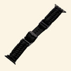 Stealth Black Paracord Braided Apple Watch Band — angled side view on Apple Watch Ultra showing full braid texture, Specimen No. 10010