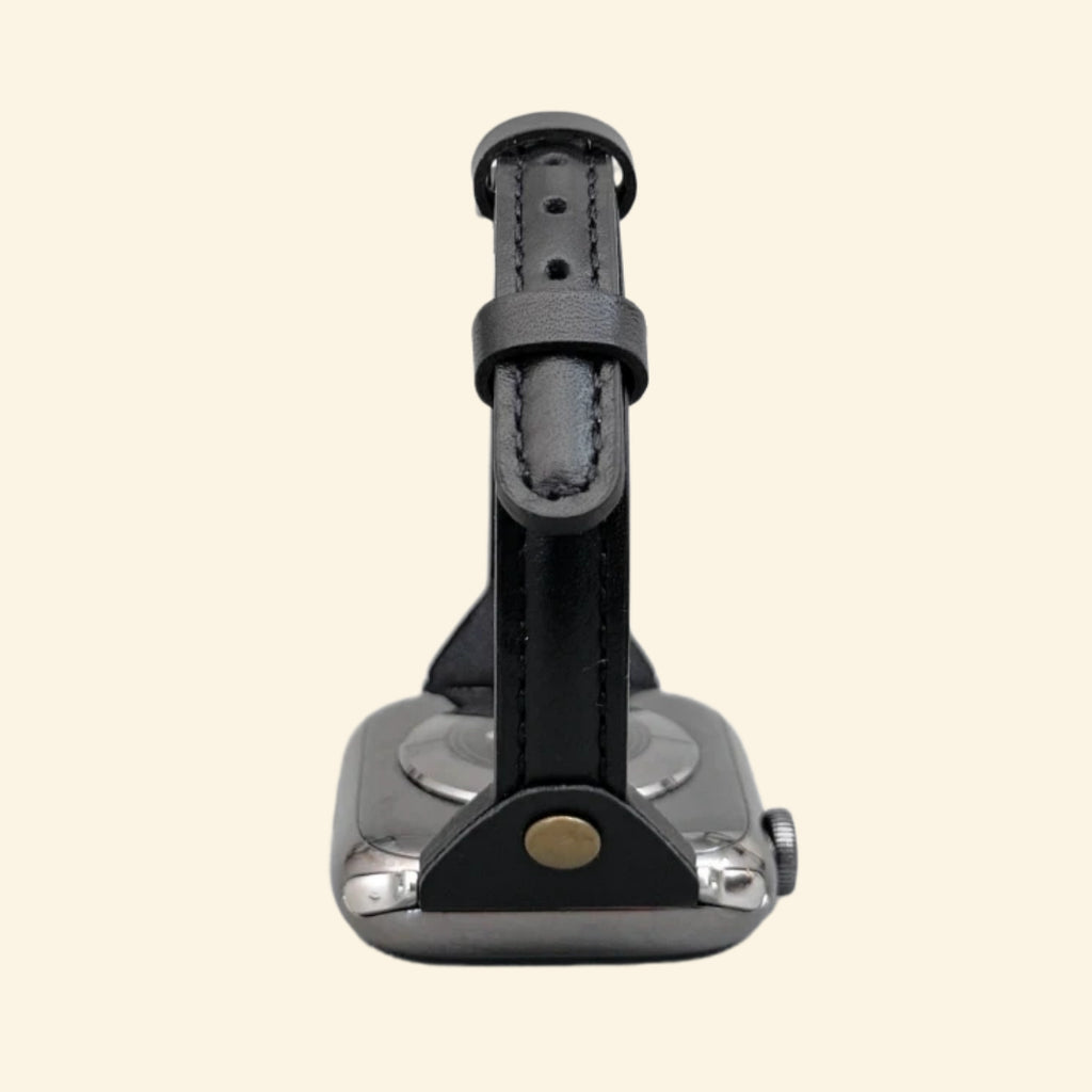 Obsidian Black Leather Band — angled side profile on Apple Watch