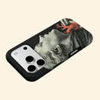 The Anatomy of Passion case – second angled floating view showing cool grey stone texture contrasting with warm anatomical red