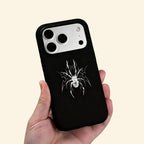 The Silver Arachnid case – second angled floating view showing full silver spider sigil linework and monochrome contrast