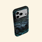The Ancient Sediment case – low-angle flat lay showing camera island and intricate dark wood crack and ring detail
