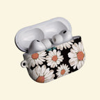 The Nocturnal Daisy — Vintage Botanical Floral Hard Case for AirPods Pro 3 & AirPods 4 - Carapace StudioAirPods CaseCarapace StudioCarapace StudioAirPods Pro 3Nocturnal Daisy AirPods case open with earbuds