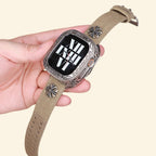 Baroque Archival Suite worn on tattooed wrist — silver case with khaki canvas strap, roman numeral watch face