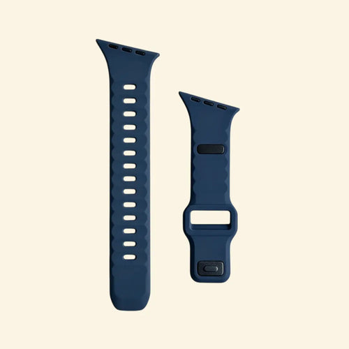 Abyssal Midnight Navy Ocean Wave Apple Watch Band — overhead wrist view on cream background