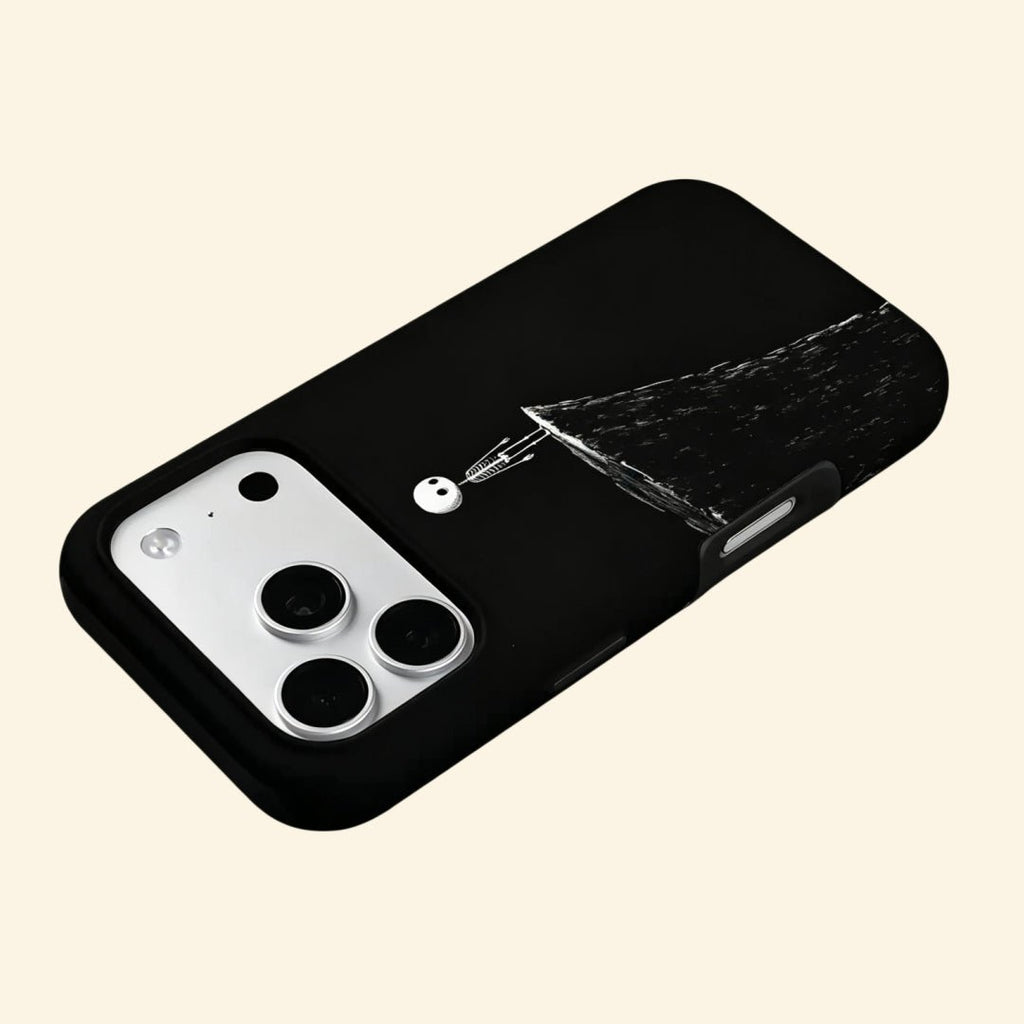 The Edge of Solitude – Whimsical Skeleton on Cliff Fine Art iPhone Case - Carapace StudioPhone CaseCarapace StudioCarapace StudioCS-5040-EDGE-SOLITUDE-5iPhone 16 Pro MaxThe Edge of Solitude case – hand-held lifestyle shot showing full whimsical skeleton perched on jagged cliff against obsidian void