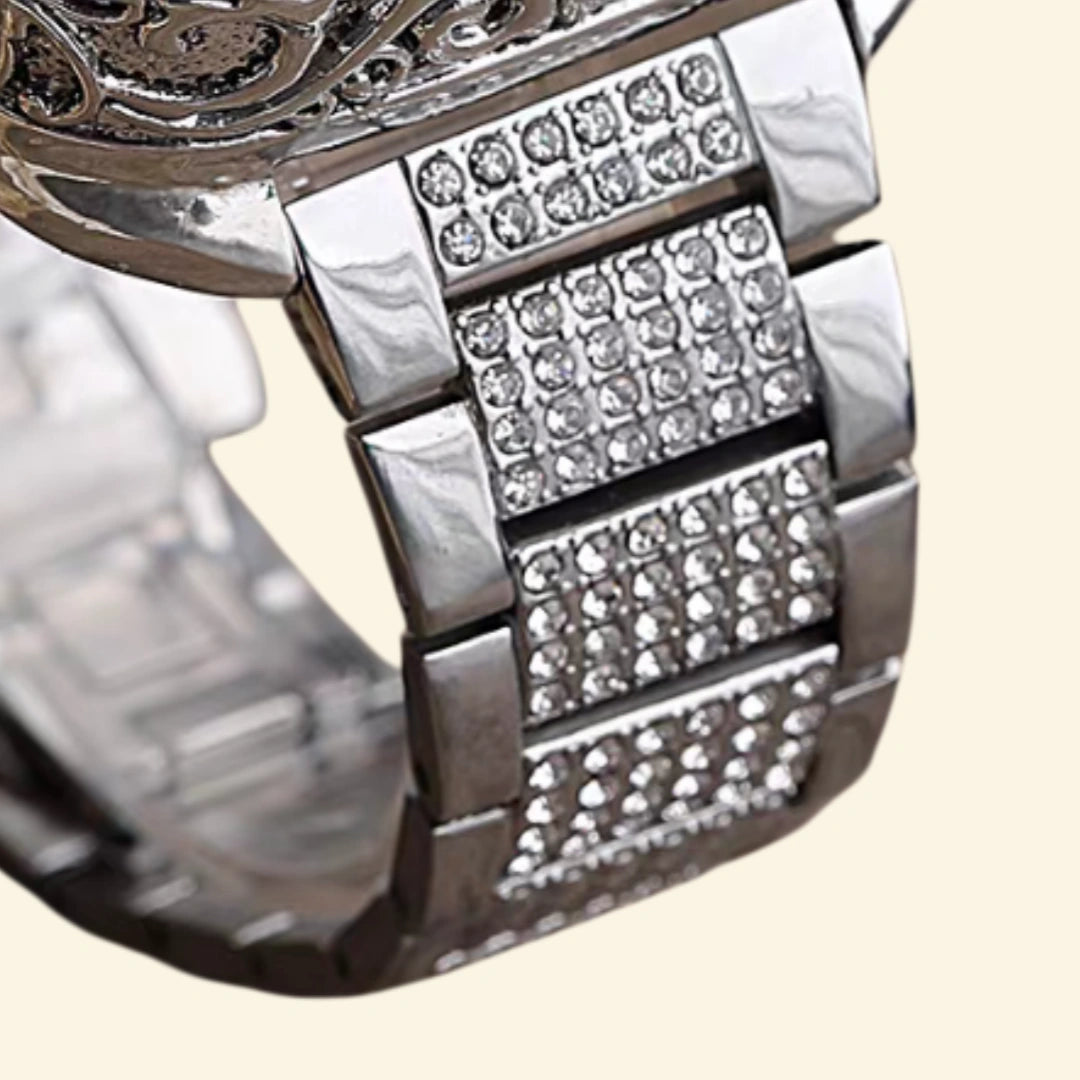 Pavé crystal stainless steel Apple Watch bracelet — close-up of crystal-inlaid links showing brilliant cut rhinestone pavé setting detail, cream background