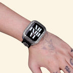 Baroque Archival Suite hand-held — silver case with khaki canvas gothic cross strap, teal roman numeral dial